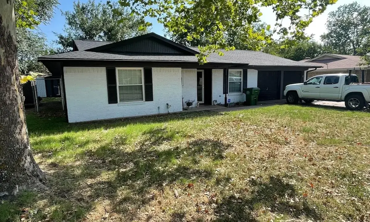Professional roofing crew working on a residential roof in Boise City